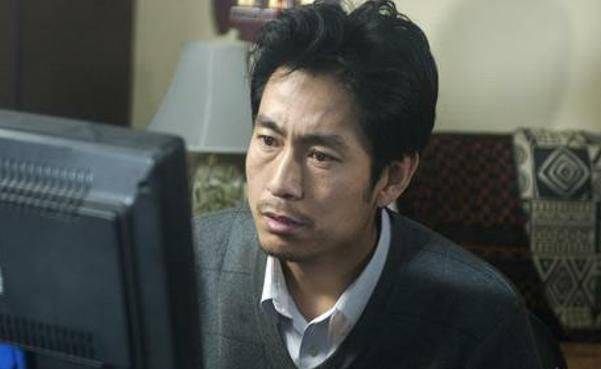 电影左右剧照:老谢对工作兢兢业业